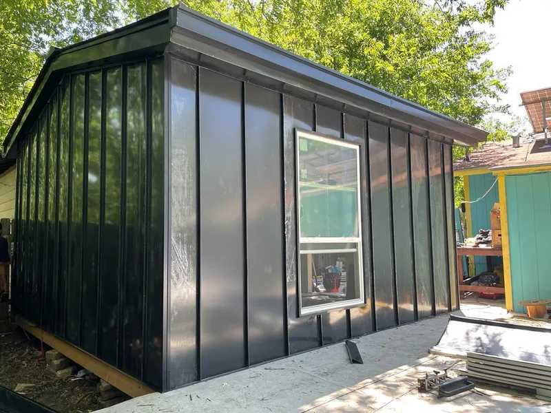 Black standing seam metal wall panels for Roof Inspection in Rice Lake